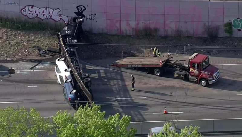 An overturned vehicle hauler on I-95 in Chester. (Credit: Fox 29)