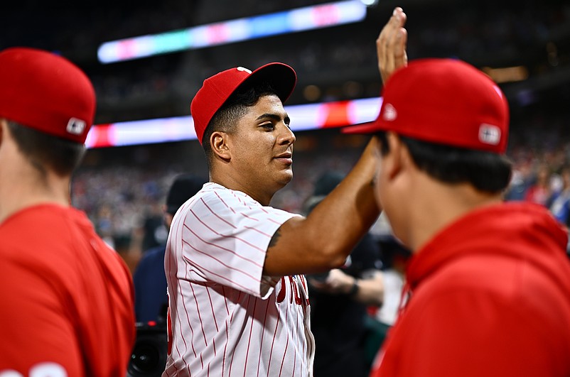 Apr 16, 2024; Philadelphia, Pennsylvania, USA; Philadelphia Phillies starting pitcher Ranger Suarez (55) celebrates with teammates after pitching a complete game shutout against the Colorado Rockies at Citizens Bank Park. Mandatory Credit: Kyle Ross-USA TODAY Sports