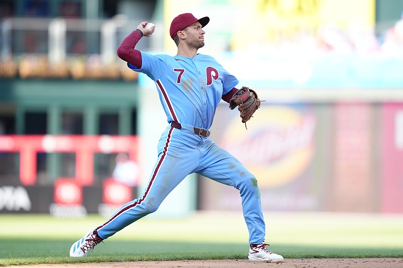 Apr 17, 2025; Philadelphia, Pennsylvania, USA; Philadelphia Phillies infielder Trea Turner (7) throws to first against the San Francisco Giants in the sixth inning at Citizens Bank Park. Mandatory Credit: Kyle Ross-Imagn Images