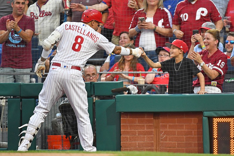 Jul 19, 2023; Philadelphia, Pennsylvania, USA; Philadelphia Phillies right fielder Nick Castellanos (8) celebrates his home run with his son Liam against the Milwaukee Brewers during the fourth inning at Citizens Bank Park. Mandatory Credit: Eric Hartline-USA TODAY Sports