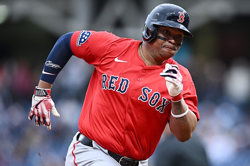 Apr 26, 2025; Cleveland, OH, USA; Boston Red Sox designated hitter Rafael Devers (11) rounds third base en route to scoring during the first inning against the Cleveland Guardians at Progressive Field. Mandatory Credit: Ken Blaze-Imagn Images