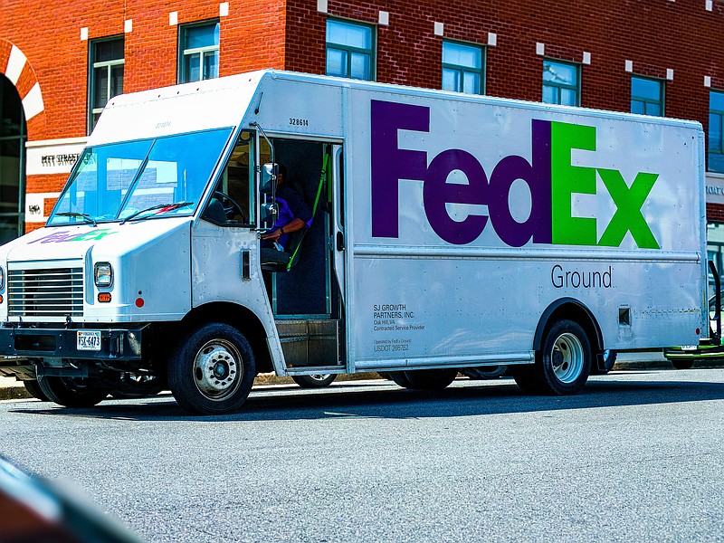 A FedEx delivery truck, much like the one pictured here, has struck a porch in Collegeville Monday evening, slowing area traffic. (Credit: Obi / Unsplash.com)