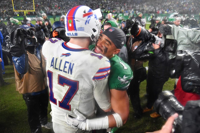 Nov 26, 2023; Philadelphia, Pennsylvania, USA; Buffalo Bills quarterback Josh Allen (17) and Philadelphia Eagles quarterback Jalen Hurts (1) meet on the field Eagles win in overtime at Lincoln Financial Field. Mandatory Credit: Eric Hartline-USA TODAY Sports