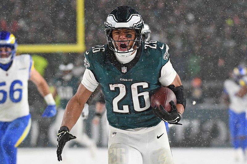 Jan 19, 2025; Philadelphia, Pennsylvania, USA; Philadelphia Eagles running back Saquon Barkley (26) runs for on a 78-yard touchdown run against the Los Angeles Rams during the fourth quarter in a 2025 NFC divisional round game at Lincoln Financial Field. Mandatory Credit: Eric Hartline-Imagn Images