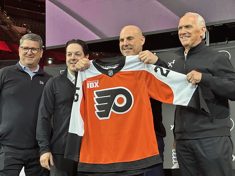 Flyers President Keith Jones, General Manager Danny Briere, new Head Coach Rick Tocchet, and Comcast Spectacor CEO and Chairman Dan Hilferty at Tocchet's introductory press conference. (Credit: Anthony SanFilippo)