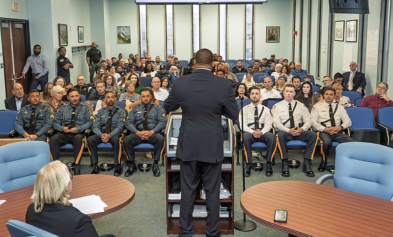 Mayor Marty Small addresses the new sergeants and lieutenants. (Photos by Edward Lea)