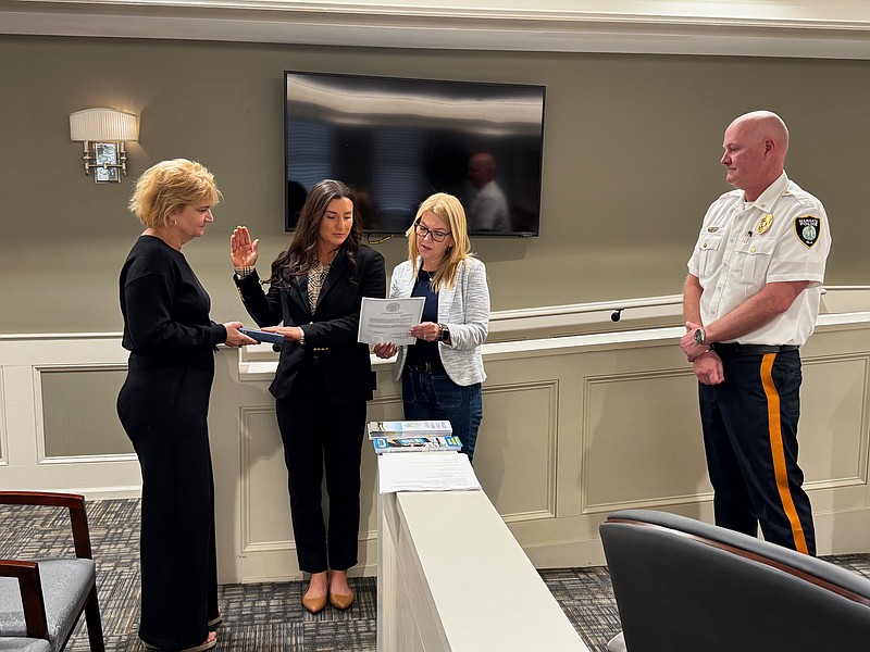 Christa Voltaggio takes the oath of office to become a Margate Police Officer, Thursday, May 15.