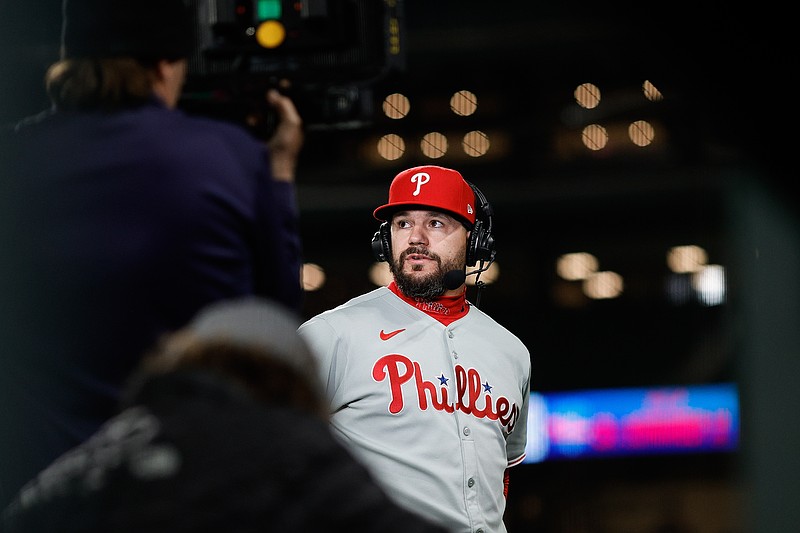 May 19, 2025; Denver, Colorado, USA; Philadelphia Phillies designated hitter Kyle Schwarber (12) is interviewed after the game against the Colorado Rockies at Coors Field. Mandatory Credit: Isaiah J. Downing-Imagn Images