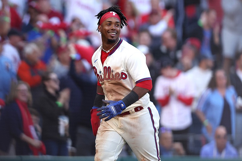 Oct 15, 2022; Philadelphia, Pennsylvania, USA; Philadelphia Phillies second baseman Jean Segura (2) reacts after scoring a run in the sixth inning against the Atlanta Braves in game four of the NLDS for the 2022 MLB Playoffs at Citizens Bank Park. Mandatory Credit: Bill Streicher-USA TODAY Sports