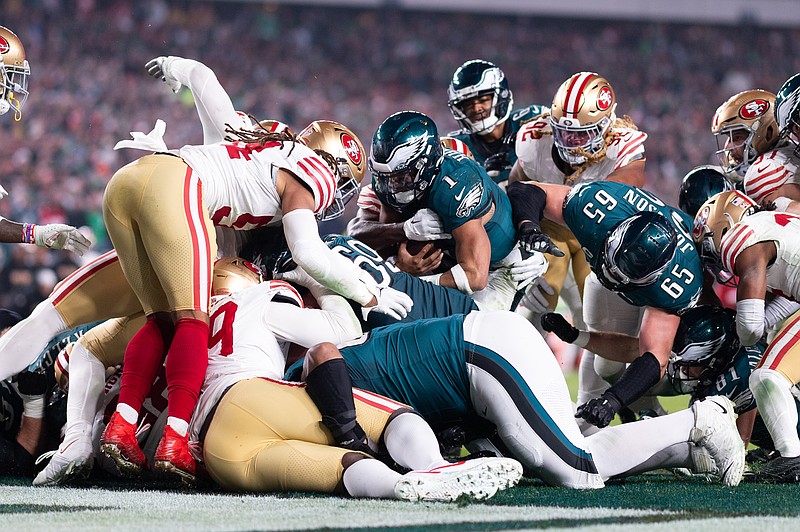 Dec 3, 2023; Philadelphia, Pennsylvania, USA; Philadelphia Eagles quarterback Jalen Hurts (1) scores a touchdown on a sneak play against the San Francisco 49ers during the third quarter at Lincoln Financial Field. Mandatory Credit: Bill Streicher-USA TODAY Sports