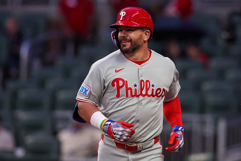 Apr 10, 2025; Atlanta, Georgia, USA; Philadelphia Phillies designated hitter Kyle Schwarber (12) celebrates after a home run against the Atlanta Braves in the third inning at Truist Park. Mandatory Credit: Brett Davis-Imagn Images