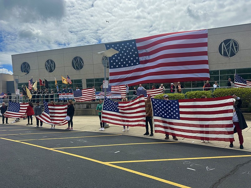 Flags are unfurled in tribute to deceased military veterans during the Flags of Liberty ceremony. (Photo courtesy of the Greater Wildwoods Tourism Improvement and Development Authority)