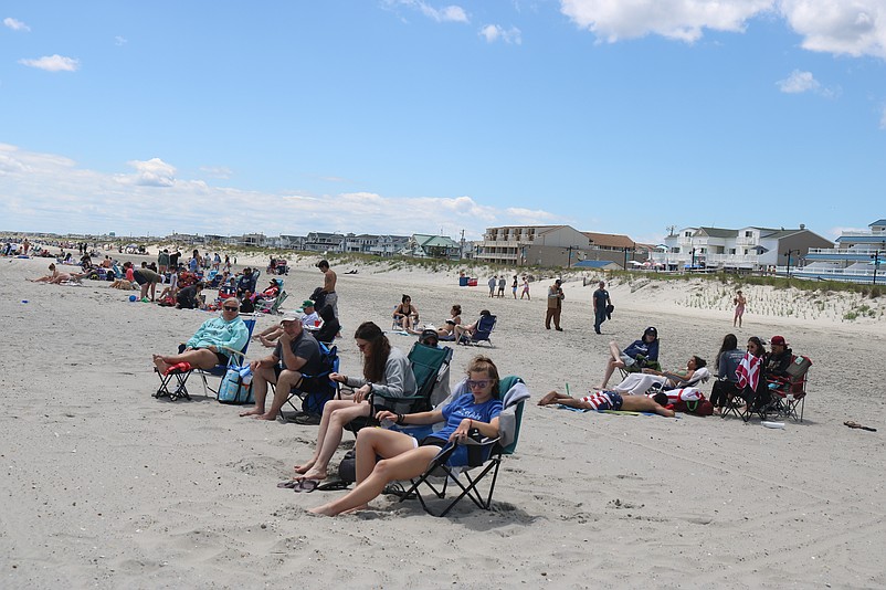 Sea Isle City beachgoers find a favorite spot to relax on the sand during the Memorial Day weekend.