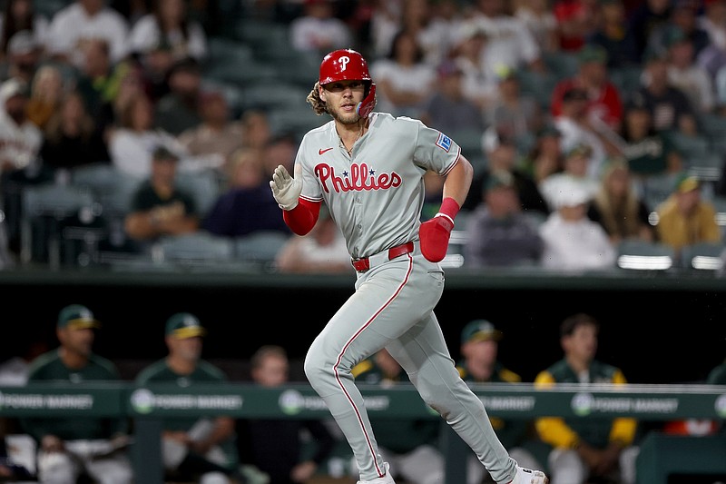 May 23, 2025; West Sacramento, California, USA; Philadelphia Phillies third baseman Alec Bohm (28) scores a run against the Athletics during the ninth inning at Sutter Health Park. Mandatory Credit: Dennis Lee-Imagn Images