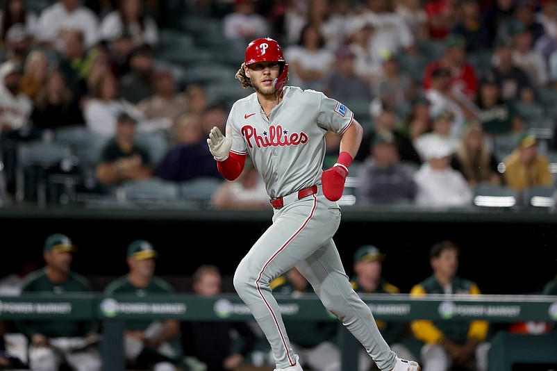 May 23, 2025; West Sacramento, California, USA; Philadelphia Phillies third baseman Alec Bohm (28) scores a run against the Athletics during the ninth inning at Sutter Health Park. Mandatory Credit: Dennis Lee-Imagn Images