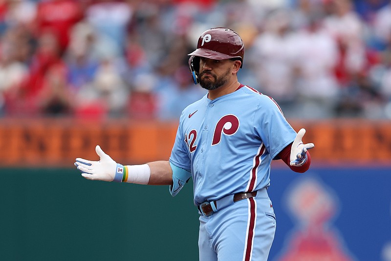Apr 3, 2025; Philadelphia, Pennsylvania, USA; Philadelphia Phillies designated hitter Kyle Schwarber (12) reacts after reaching second base on a fielding error during the fifth inning against the Colorado Rockies at Citizens Bank Park. Mandatory Credit: Bill Streicher-Imagn Images