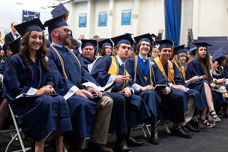 Members of Bucks County Community College’s Class of 2025 get ready to celebrate at the 59th Annual Commencement Ceremony May 22. The public, two-year college conferred a total of 882 associate degrees and certificates during the 2024-25 academic year. (Credit: Eric Parker, Bucks County Community College)