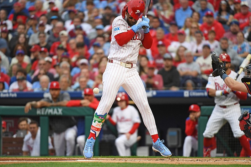 May 27, 2025; Philadelphia, Pennsylvania, USA; Philadelphia Phillies first base Bryce Harper (3) is hit by a pitch during the first inning against the Atlanta Braves at Citizens Bank Park. Mandatory Credit: Eric Hartline-Imagn Images
