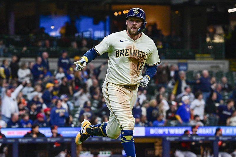 May 21, 2025; Milwaukee, Wisconsin, USA; Milwaukee Brewers first baseman Rhys Hoskins (12) reacts after hitting a solo home run in the sixth inning against the Baltimore Orioles at American Family Field. Mandatory Credit: Benny Sieu-Imagn Images