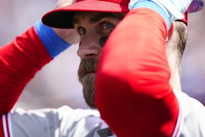 May 22, 2025; Denver, Colorado, USA; Philadelphia Phillies first base Bryce Harper (3) prepares to take to the field in the seventh inning against the Colorado Rockies at Coors Field. Mandatory Credit: Ron Chenoy-Imagn Images
