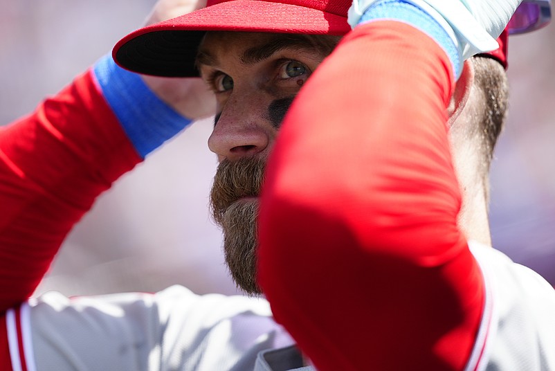 May 22, 2025; Denver, Colorado, USA; Philadelphia Phillies first base Bryce Harper (3) prepares to take to the field in the seventh inning against the Colorado Rockies at Coors Field. Mandatory Credit: Ron Chenoy-Imagn Images