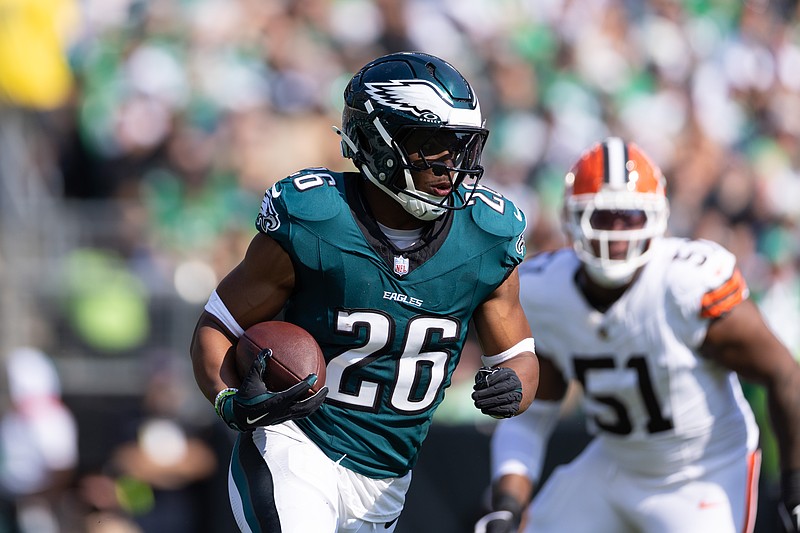 Oct 13, 2024; Philadelphia, Pennsylvania, USA; Philadelphia Eagles running back Saquon Barkley (26) runs with the ball against the Cleveland Browns during the first quarter at Lincoln Financial Field. Mandatory Credit: Bill Streicher-Imagn Images