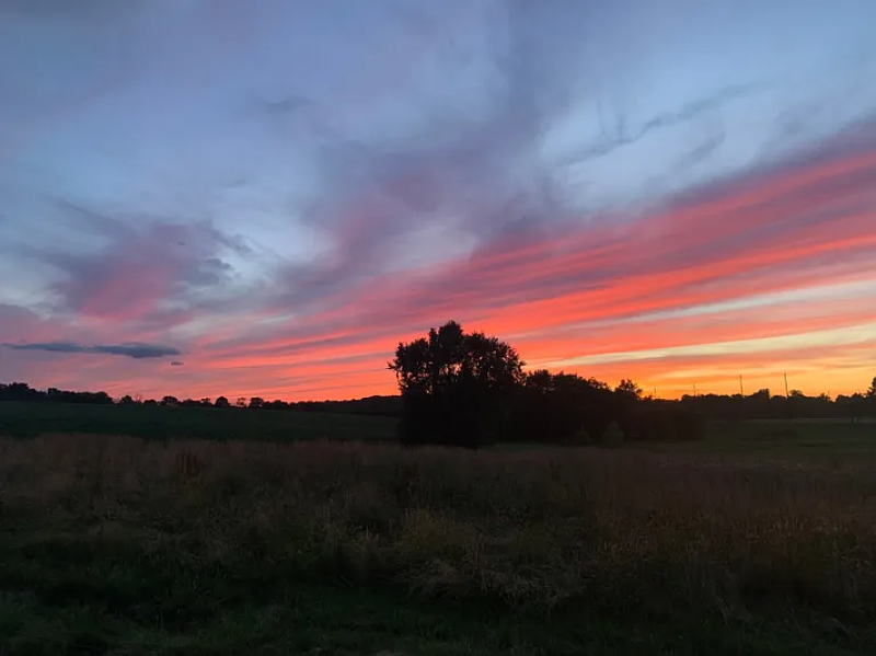 The sun sets over the Freddy Hill Farms property in Towamencin, as seen from Kriebel Road in June 2022. (Photo courtesy of Casey Hannings)