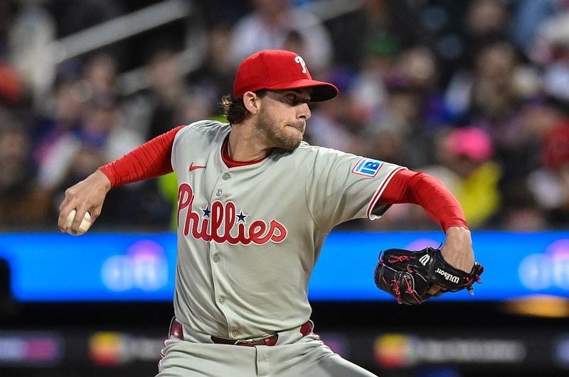 Apr 21, 2025; New York City, New York, USA; Philadelphia Phillies pitcher Aaron Nola (27) pitches against the New York Mets during the first inning at Citi Field. Mandatory Credit: John Jones-Imagn Images