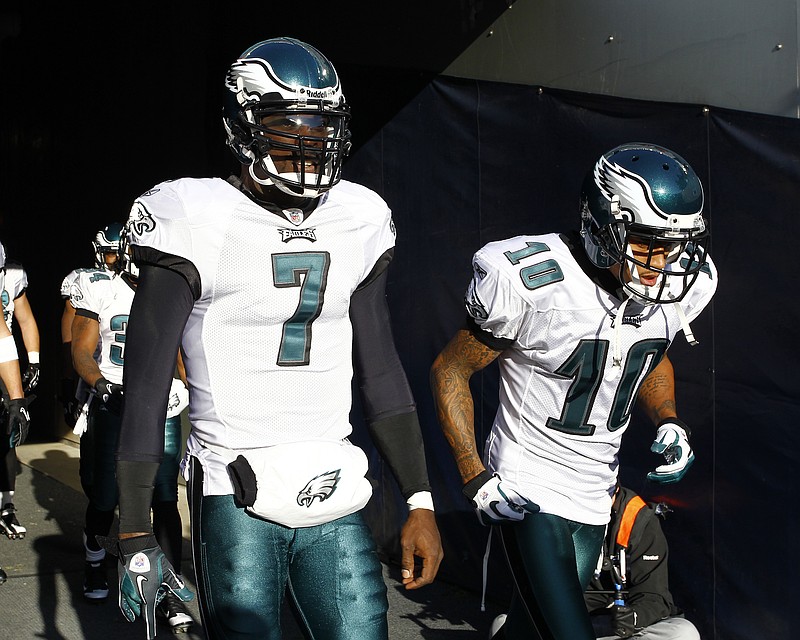 Nov 28, 2010; Chicago, IL, USA; Philadelphia Eagles quarterback Michael Vick (7) and wide receiver DeSean Jackson (10)during pre game warm ups against the Chicago Bears at Soldier Field. Mandatory Credit: Mike DiNovo-USA TODAY Sports