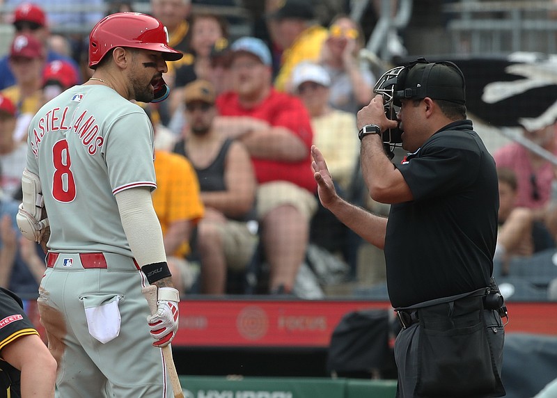Jun 7, 2025; Pittsburgh, Pennsylvania, USA; Philadelphia Phillies outfielder Nick Castellanos (8) argues with home plate umpire Nestor Ceja (33) after Castellanos was called out on strikes by the Pittsburgh Pirates during the seventh inning at PNC Park. Mandatory Credit: Charles LeClaire-Imagn Images