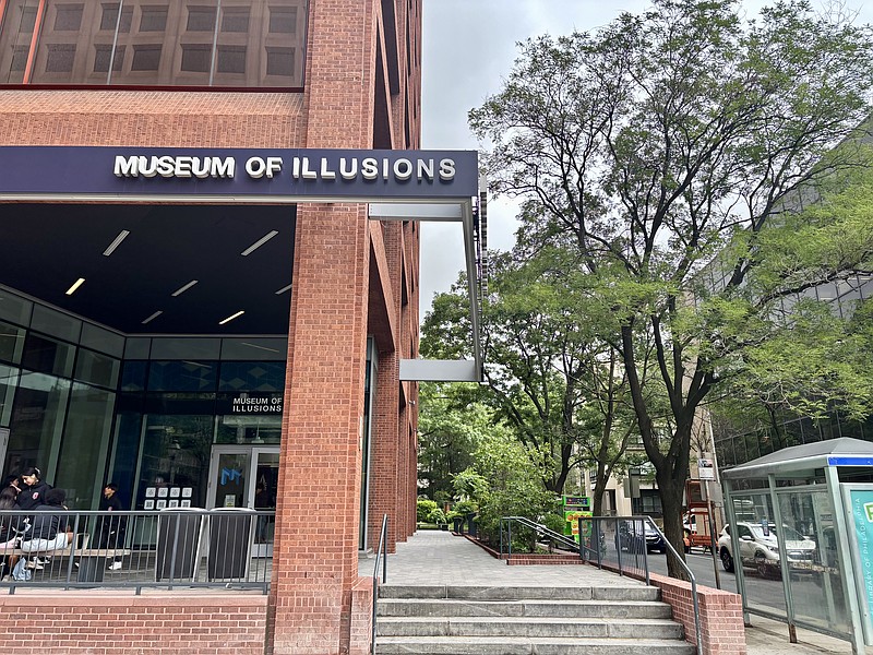 Visitors explore mind-bending exhibits at the Museum of Illusions, where your mind plays tricks on you.