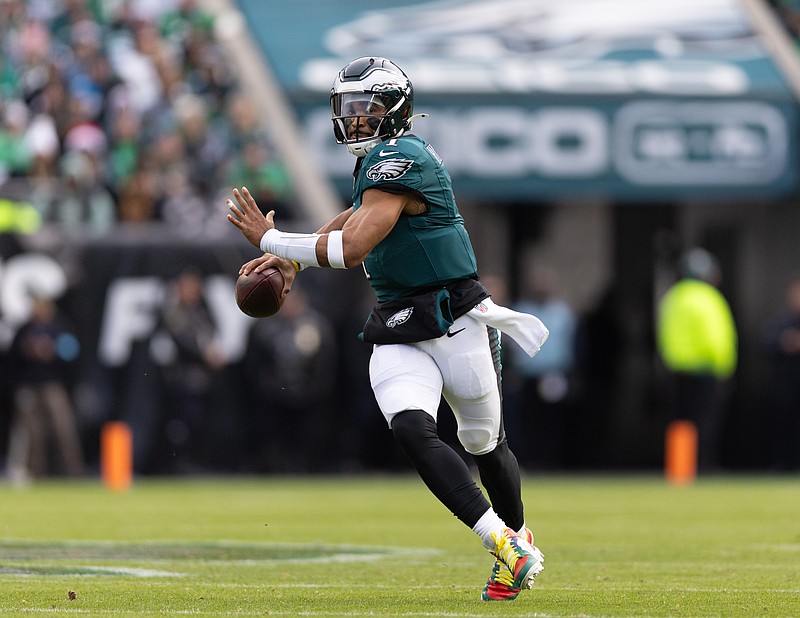 Dec 8, 2024; Philadelphia, Pennsylvania, USA;  Philadelphia Eagles quarterback Jalen Hurts (1) in action against the Carolina Panthers during the second quarter at Lincoln Financial Field. Mandatory Credit: Bill Streicher-Imagn Images