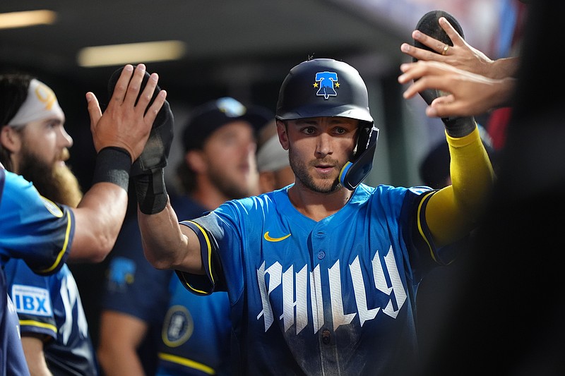 May 30, 2025; Philadelphia, Pennsylvania, USA; Philadelphia Phillies infielder Trea Turner (7) celebrates with teammates after scoring a run against the Milwaukee Brewers in the fourth inning at Citizens Bank Park. Mandatory Credit: Kyle Ross-Imagn Images