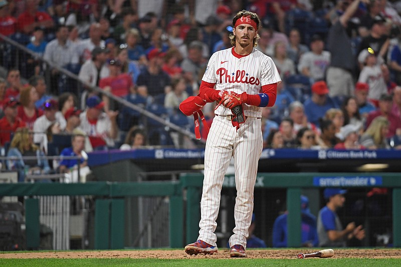 Jun 10, 2025; Philadelphia, Pennsylvania, USA; Philadelphia Phillies second base Bryson Stott (5) reacts after striking out to end the fifth inning against the Chicago Cubs at Citizens Bank Park. Mandatory Credit: Eric Hartline-Imagn Images