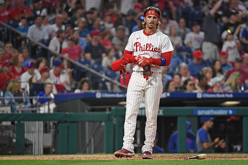 Jun 10, 2025; Philadelphia, Pennsylvania, USA; Philadelphia Phillies second base Bryson Stott (5) reacts after striking out to end the fifth inning against the Chicago Cubs at Citizens Bank Park. Mandatory Credit: Eric Hartline-Imagn Images