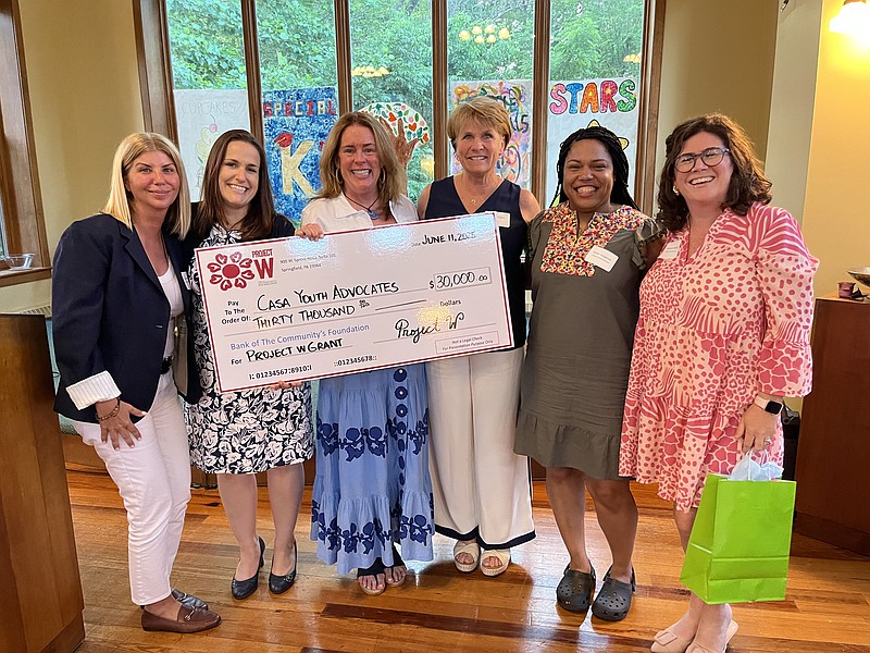 CASA Youth Advocates of Delaware and Chester Counties received a $30,000 grant from Project W. Pictured left to right:  Katie Topolewski and Leigh Anne McKelvey from CASA; Susan McCann and Karen Rogers, co-chairs of the Project W Family Grant Committee; Kiera Hargrove and Shannon Bruno from CASA.