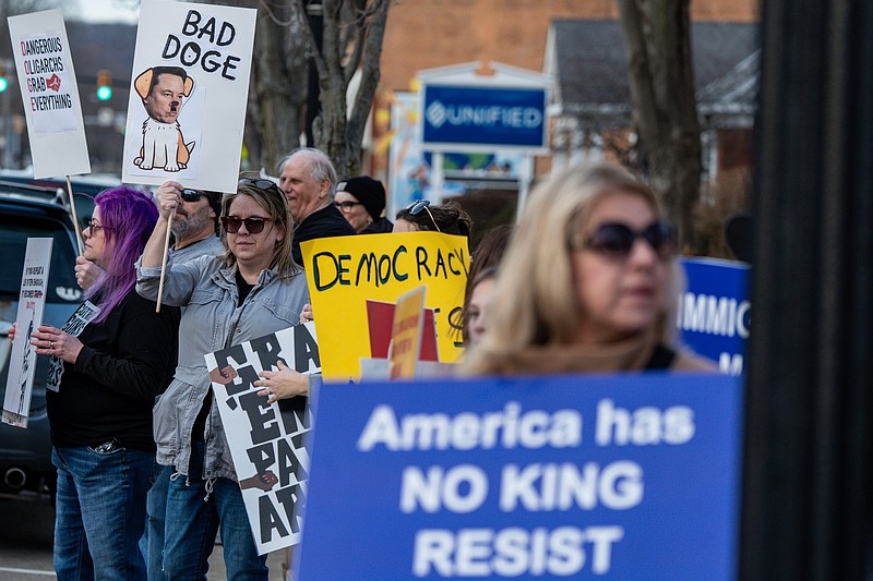 Participants of the March 4 Defend Democracy protest, at the corner of North Broadway and High Avenue in New Philadelphia. Credit: © ANDREW DOLPH/TIMES-REPORTER / USA TODAY NETWORK via Imagn Images
