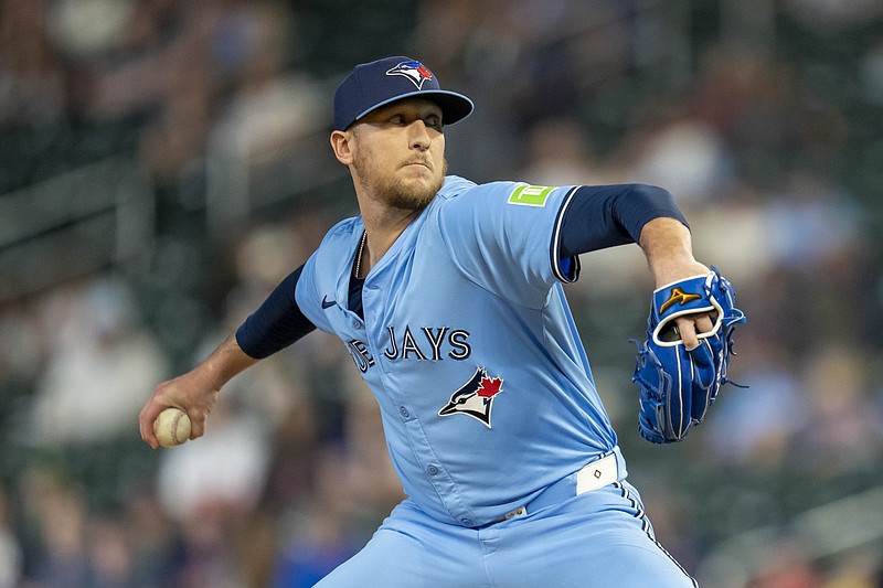 Jun 6, 2025; Minneapolis, Minnesota, USA; Toronto Blue Jays relief pitcher Jeff Hoffman (23) delivers a pitch against the Minnesota Twins in the ninth inning against the Minnesota Twins at Target Field. Mandatory Credit: Jesse Johnson-Imagn Images