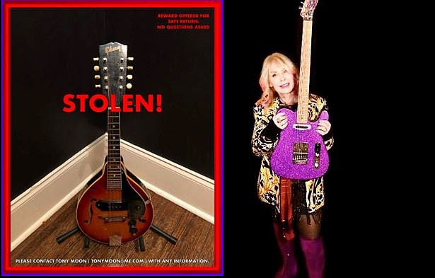 Nancy Wilson posted a Facebook photo with her returned guitar. The mandolin is still missing.