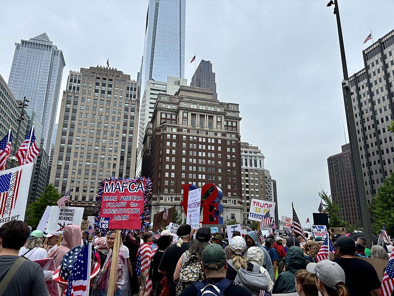 Demonstrators gather in Love Park for the "No Kings" protest, one of 2,000 organized protests happening nationally on Saturday. The rally and march will continue up to the Art Museum steps through the afternoon. (Credit: Kate Jackson)