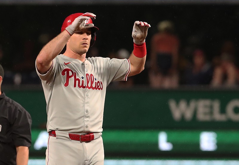 Jun 6, 2025; Pittsburgh, Pennsylvania, USA;  Philadelphia Phillies catcher J.T. Realmuto (10) reacts at second base with a double against the Pittsburgh Pirates during the fourth inning at PNC Park. Mandatory Credit: Charles LeClaire-Imagn Images