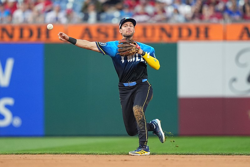 Jun 13, 2025; Philadelphia, Pennsylvania, USA; Philadelphia Phillies infielder Trea Turner (7) throws to first against the Toronto Blue Jays in the fifth inning at Citizens Bank Park. Mandatory Credit: Kyle Ross-Imagn Images