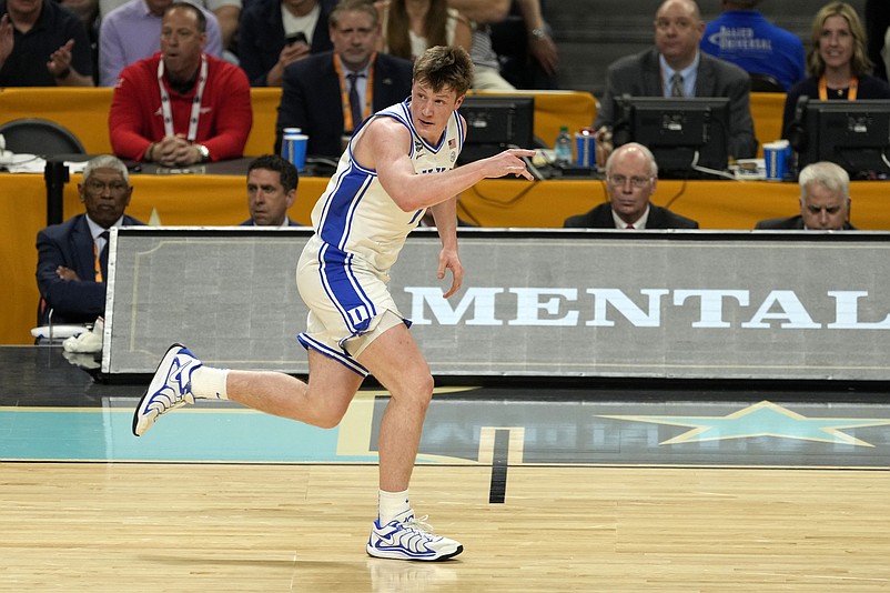 Apr 5, 2025; San Antonio, TX, USA; Duke Blue Devils guard Kon Knueppel (7) reacts after a play against the Houston Cougars during the first half in the semifinals of the men's Final Four of the 2025 NCAA Tournament at Alamodome. Mandatory Credit: Scott Wachter-Imagn Images