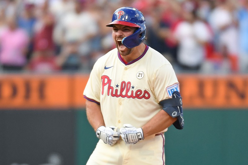 Sep 15, 2024; Philadelphia, Pennsylvania, USA; Philadelphia Phillies second base Buddy Kennedy (19) celebrates his Rbi double during the eighth inning against the New York Mets at Citizens Bank Park. Mandatory Credit: Eric Hartline-Imagn Images