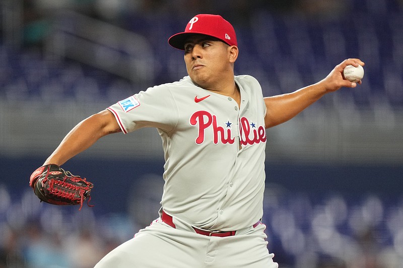 Jun 18, 2025; Miami, Florida, USA;  Philadelphia Phillies pitcher Ranger Su‡rez (55) pitches in the first inning against the Miami Marlins at loanDepot Park. Mandatory Credit: Jim Rassol-Imagn Images
