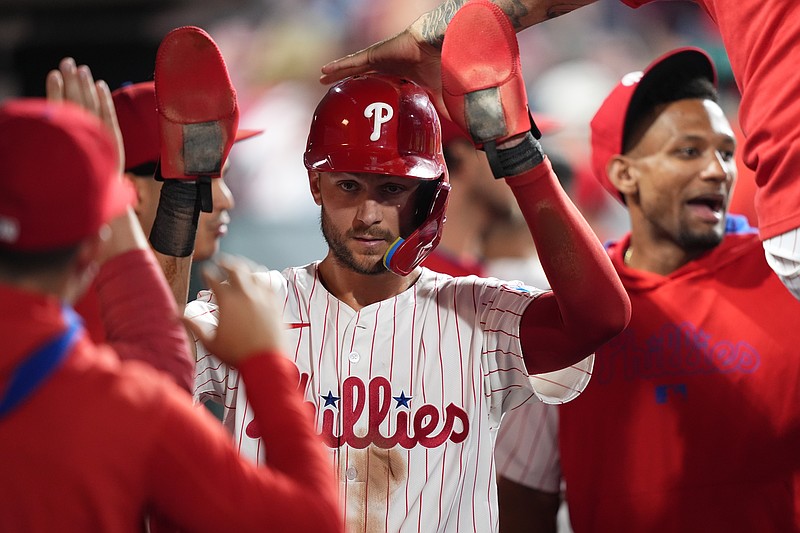 Jun 21, 2025; Philadelphia, Pennsylvania, USA; Philadelphia Phillies infielder Trea Turner (7) celebrates with teammates after scoring a run against the New York Mets in the fifth inning at Citizens Bank Park. Mandatory Credit: Kyle Ross-Imagn Images