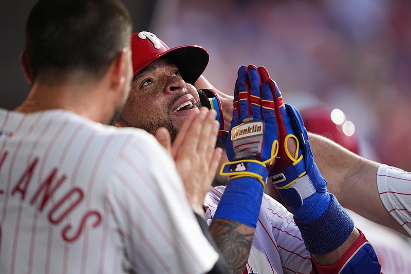 Jun 22, 2025; Philadelphia, Pennsylvania, USA; Philadelphia Phillies infielder Edmundo Sosa (33) celebrates with teammates after hitting a three-run home run against the New York Mets in the fourth inning at Citizens Bank Park. Mandatory Credit: Kyle Ross-Imagn Images