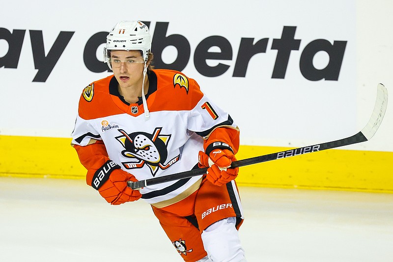 Apr 3, 2025; Calgary, Alberta, CAN; Anaheim Ducks center Trevor Zegras (11) skates during the warmup period against the Calgary Flames at Scotiabank Saddledome. Mandatory Credit: Sergei Belski-Imagn Images