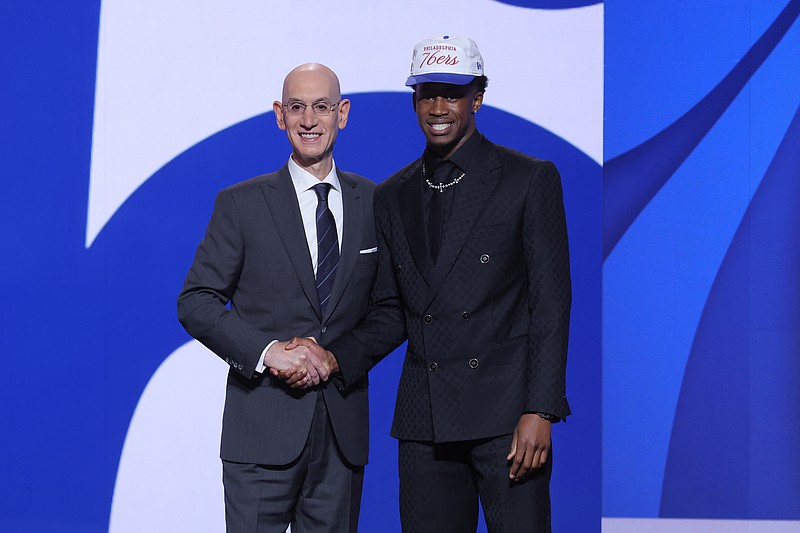 Jun 25, 2025; Brooklyn, NY, USA; VJ Edgecombe stands with NBA commissioner Adam Silver after being selected as the third pick by the Philadelphia 76ers in the first round of the 2025 NBA Draft at Barclays Center. Mandatory Credit: Brad Penner-Imagn Images