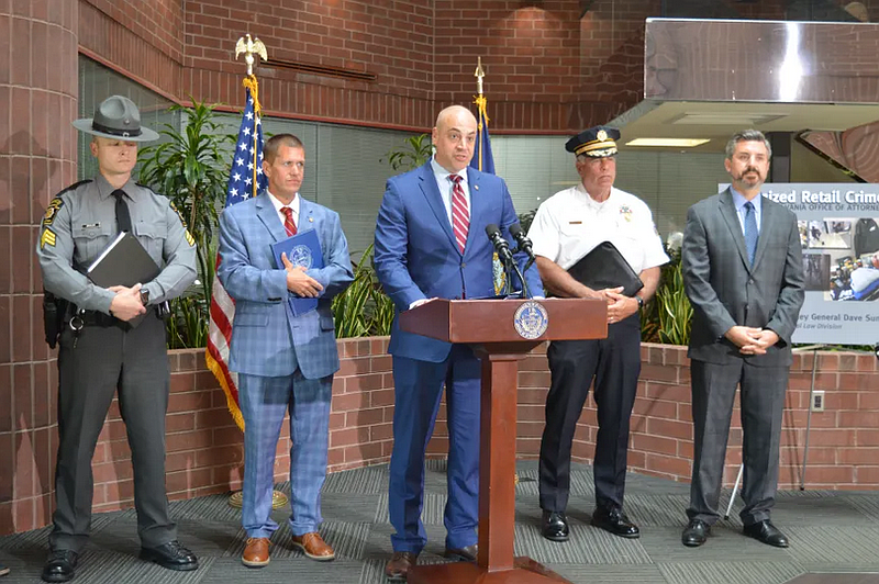 Pennsylvania Attorney General Dave Sunday addresses organized retail theft enforcement operations during a June 25, 2025 press conference in Montgomery County joined by law enforcement representatives.